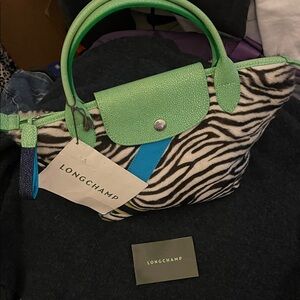 Super cool:  LONGCHAMP PILAGE Lamb skin leather bag.